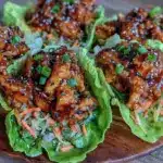 crispy asian sesame chicken lettuce wraps - featured image